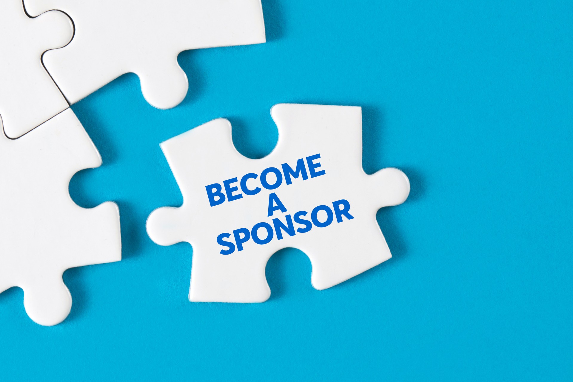 Puzzle Pieces with Become a Sponsor Message